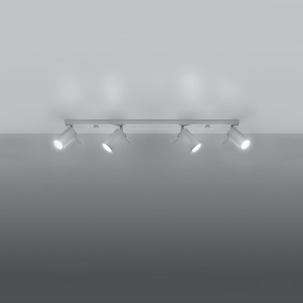 Plafonnier barre 4 spots orientables blanc dans un salon contemporain