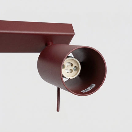 Plafonnier Barre 4 Spots Orientables Bordeaux, packshot de trois quarts