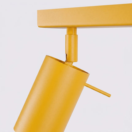Plafonnier Barre 4 Spots Orientables Jaune Ambré, détail de la fixation