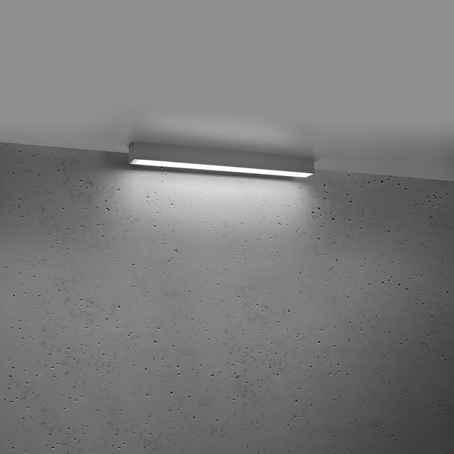 Plafonnier barre moderne LED gris allumé, diffuseur opale lumineux homogène