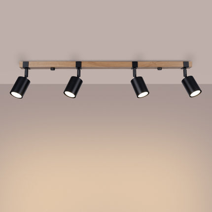 Plafonnier bois et acier noir 4 spots, vue de profil montrant l’orientation