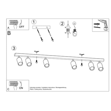 Gros plan sur un spot cylindrique en bois du plafonnier orientable