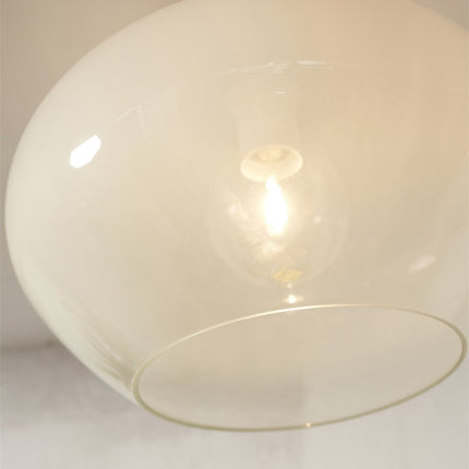 Detail of the blown glass globe with gradient effect of the Bologna ceiling light