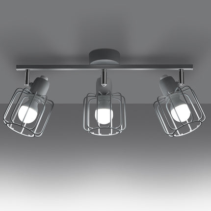 Gros plan sur une des cages filiformes du plafonnier orientable blanc 3 spots