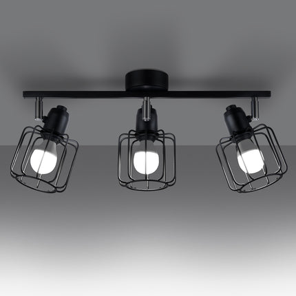 Gros plan sur une des cages filiformes du plafonnier orientable noir 3 spots