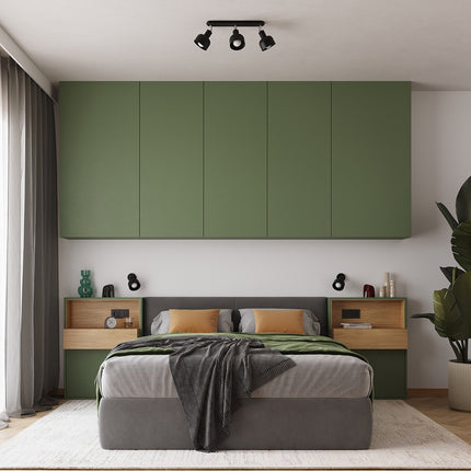 Plafonnier Elba noir trois spots dans une chambre au décor vert et bois