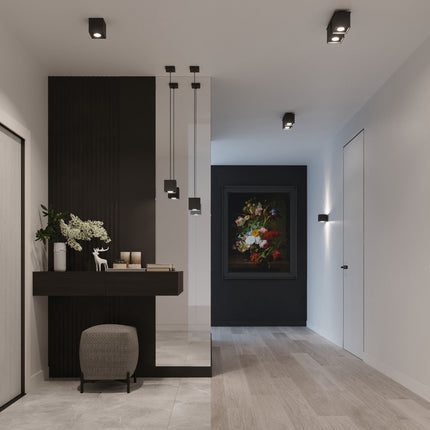 Plafonnier cube LED noir créant une ambiance moderne