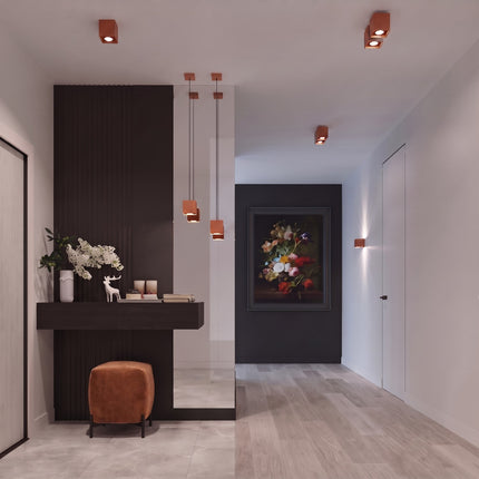 Plafonnier Cube LED ocre rouge au-dessus d'un plan de travail