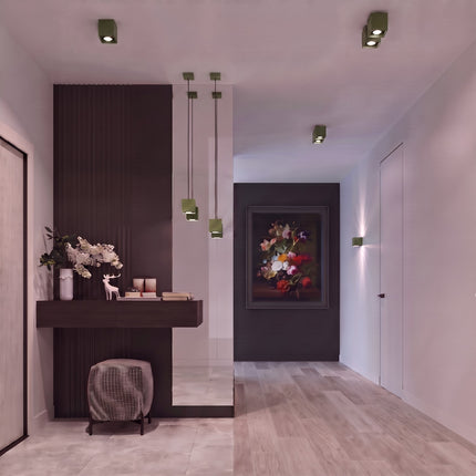 Plafonnier Cube LED vert olive au-dessus d'un plan de travail