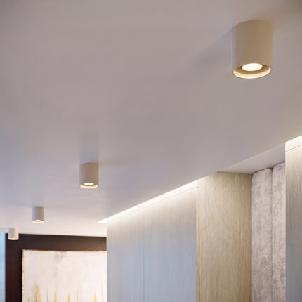 Plafonnier Cylindre LED beige clair au-dessus d'un plan de travail