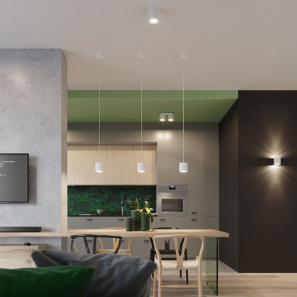 Plafonnier cylindre LED blanc créant une ambiance douce