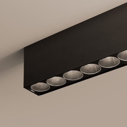 Détail des lentilles anti-éblouissement du Plafonnier Design Poutre allumé