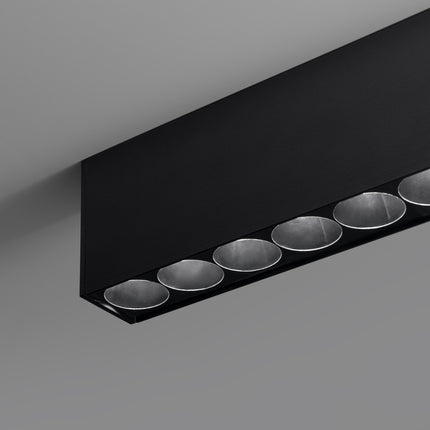 Détail des lentilles anti-éblouissement du Plafonnier Design Poutre allumé