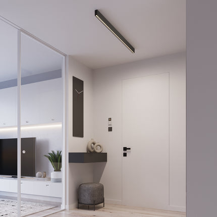 Plafonnier Design Poutre noir dans un intérieur contemporain épuré