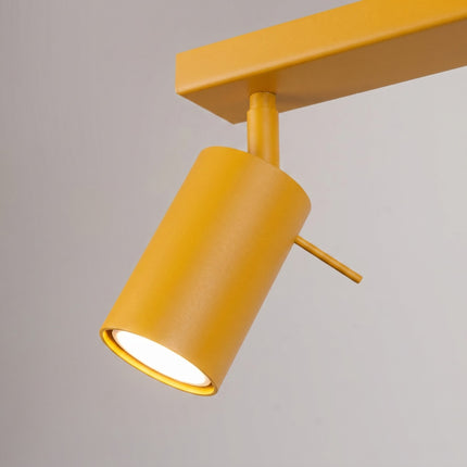 Plafonnier Directionnel 2 Spots LED Jaune Ambré, vue sur fond coloré