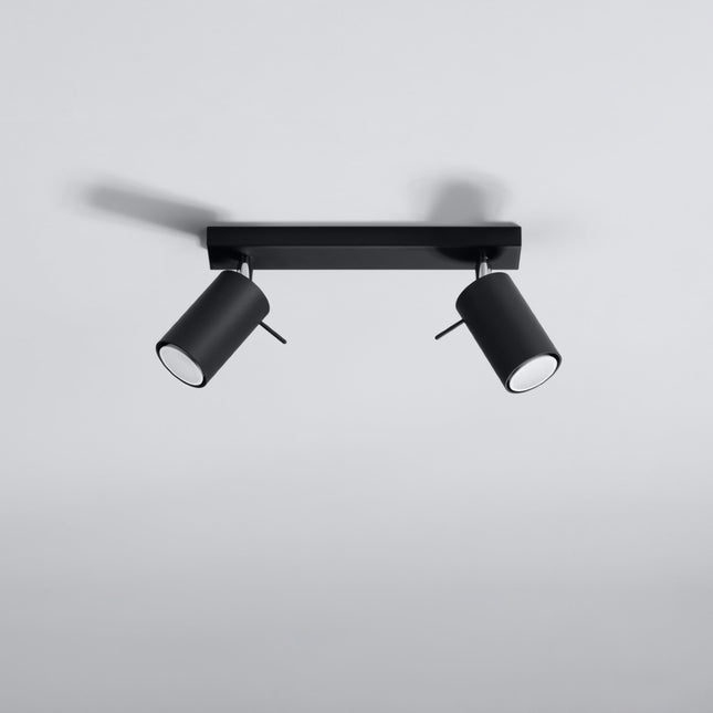 Plafonnier directionnel 2 spots LED noir éclairant un salon