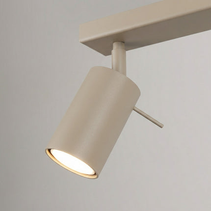 Plafonnier Directionnel 2 Spots LED Taupe, vue sur fond coloré