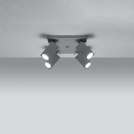 Plafonnier directionnelle carré 4 spots orientables gris installé dans une pièce lumineuse