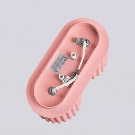 Plafonnier Double Aura 2 Aluminium Cannelé Rose Poudré GU10, vue sur fond coloré