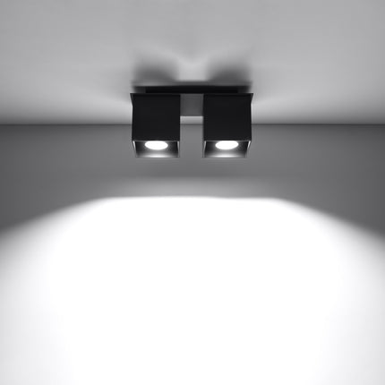 Plafonnier double cube LED noir éclairant une entrée