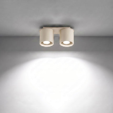 Plafonnier Double Cylindre LED beige clair allumée, faisceau net
