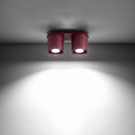 Plafonnier Double Cylindre LED bordeaux allumée, faisceau net