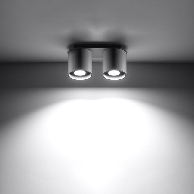 Plafonnier double cylindre LED gris éclairant une entrée