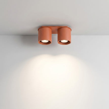 Plafonnier Double Cylindre LED ocre rouge allumée, faisceau net