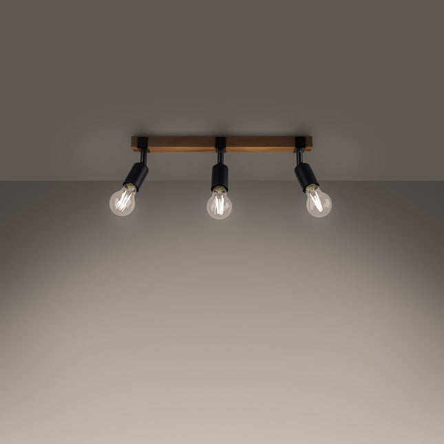 Plafonnier Élégance Bois Noir 3 spots allumé, lumière chaude diffusée par les ampoules à filament