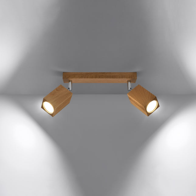 Plafonnier facette cubique en chêne vu de profil, orientation des deux têtes lumineuses.
