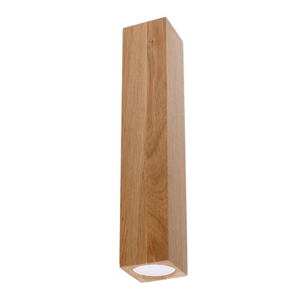 Plafonnier facette cubique colonne en chêne, vue de face, volume allongé fixé au plafond.