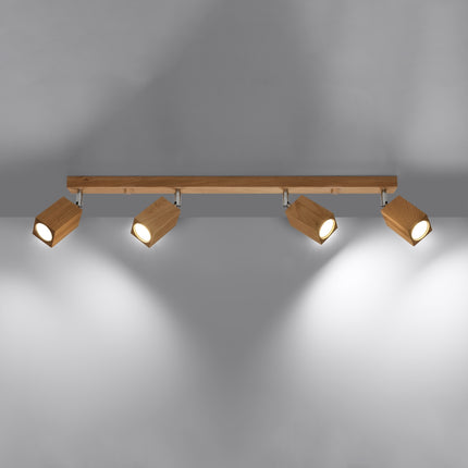 Plafonnier facette cubique en chêne vu de profil, orientation des quatre têtes lumineuses.