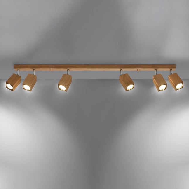 Plafonnier facette cubique en chêne vu de profil, orientation des six têtes lumineuses.
