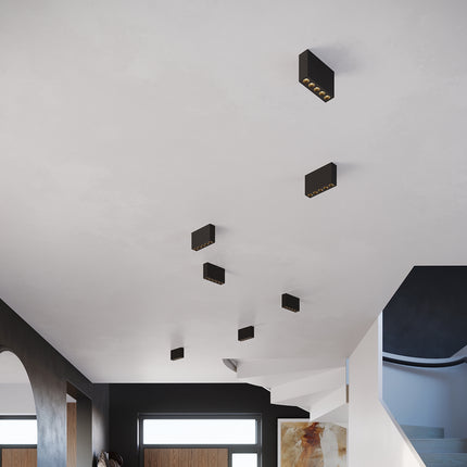 Plafonnier Focus Rectangulaire noir, gros plan sur les cinq optiques LED alignées