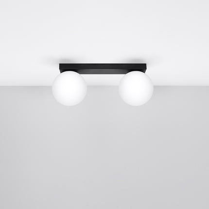 Plafonnier Globe Solis 2 globes noir fixé au plafond, deux sphères en verre opale blanc allumées