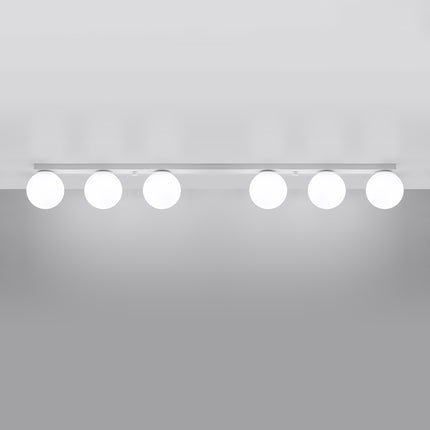Plafonnier Globe Solis 6 globes allumé, lumière douce diffusée par les globes en verre opale blanc