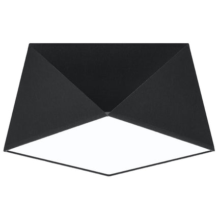 Plafonnier géométrique Hexa noir à facettes sur fond clair, forme prismatique et diffuseur carré