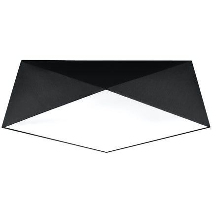 Plafonnier géométrique Hexa noir à facettes sur fond clair, forme prismatique et large diffuseur carré