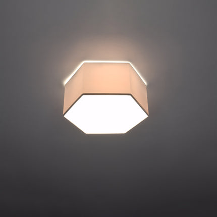Plusieurs plafonniers Hexagonal Pure assemblés en nid d'abeille, présentation sur fond blanc studio.