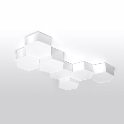 Schéma de montage du plafonnier Hexagonal Pure, fixation au plafond avec chevilles et vis.