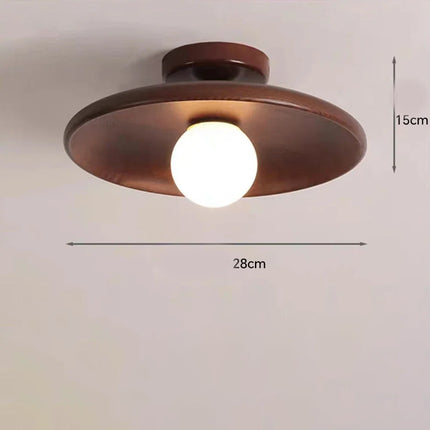 Plafonnier en bois nordique diffusant une lumière LED homogène