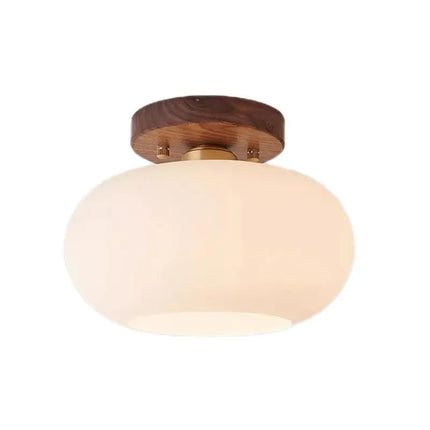 Plafonnier rond en bois diffusant une lumière douce