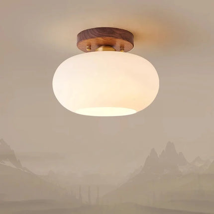 Plafonnier LED rond en bois de noyer et verre au design moderne