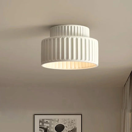 Plafonnier LED nordique en résine perforée au design minimaliste