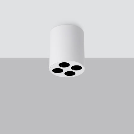 Plafonnier multi-spot blanc en aluminium fixé au plafond, quatre foyers LED orientables, vue de face en ambiance claire