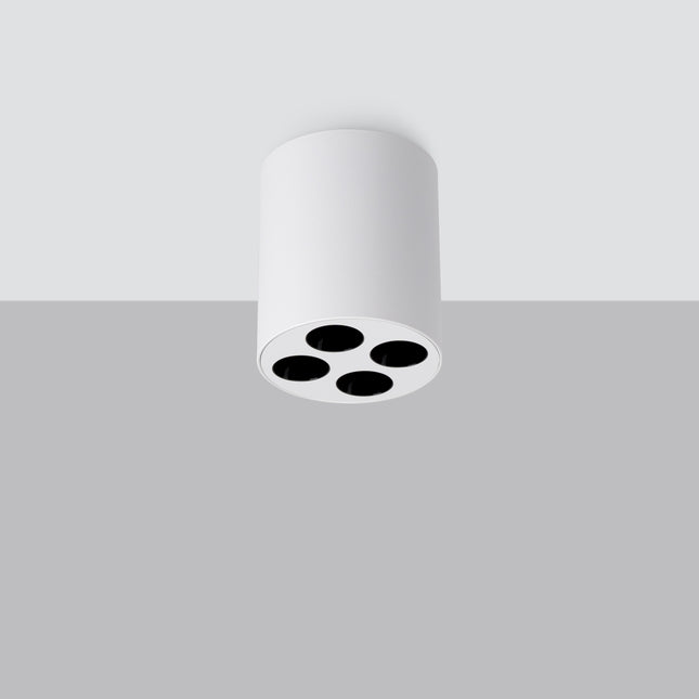 Plafonnier multi-spot blanc en aluminium fixé au plafond, quatre foyers LED orientables, vue de face en ambiance claire