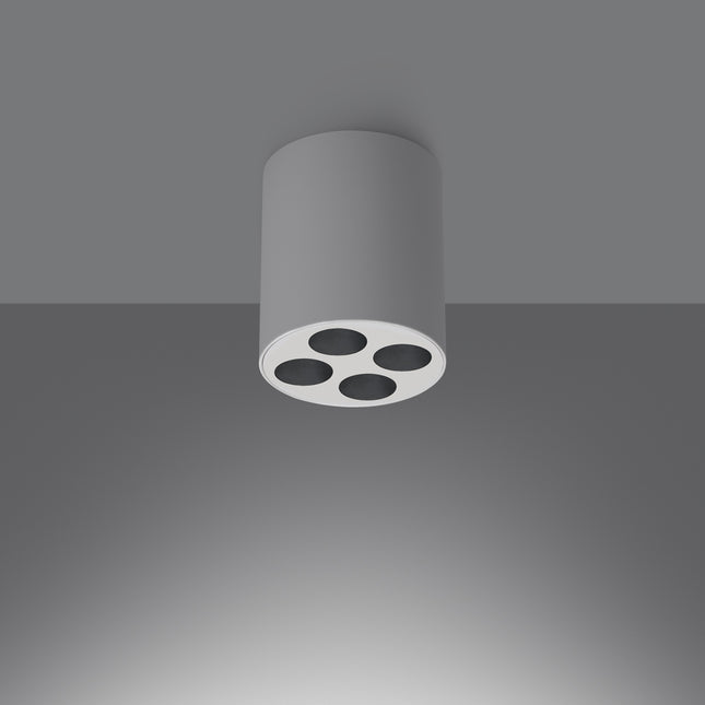 Plafonnier cylindrique blanc quatre spots LED, vue de trois quarts montrant le fini aluminium mat