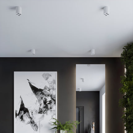Plafonnier multi-spot blanc, gros plan sur les quatre optiques LED intégrées