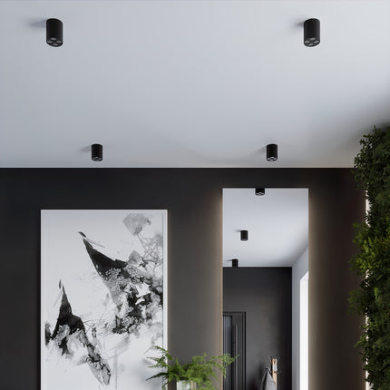 Plafonnier multi-spot noir, gros plan sur les quatre optiques LED intégrées