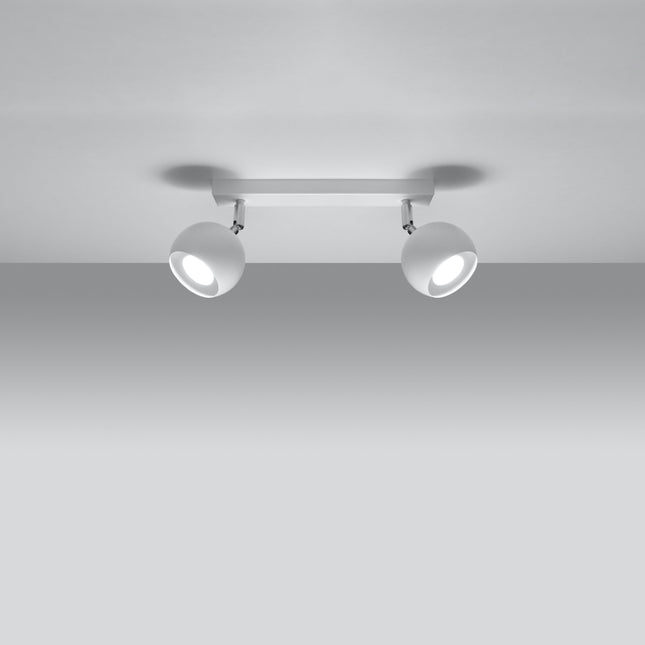 Plafonnier oculaire 2 spots orientables blanc installé dans une pièce lumineuse